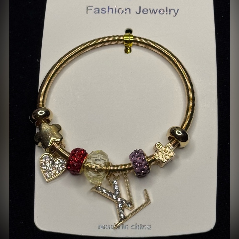 Fashion Jewelry Gold Tone Sparkling Heart
Charm Stretch Bracelet Red Purple
